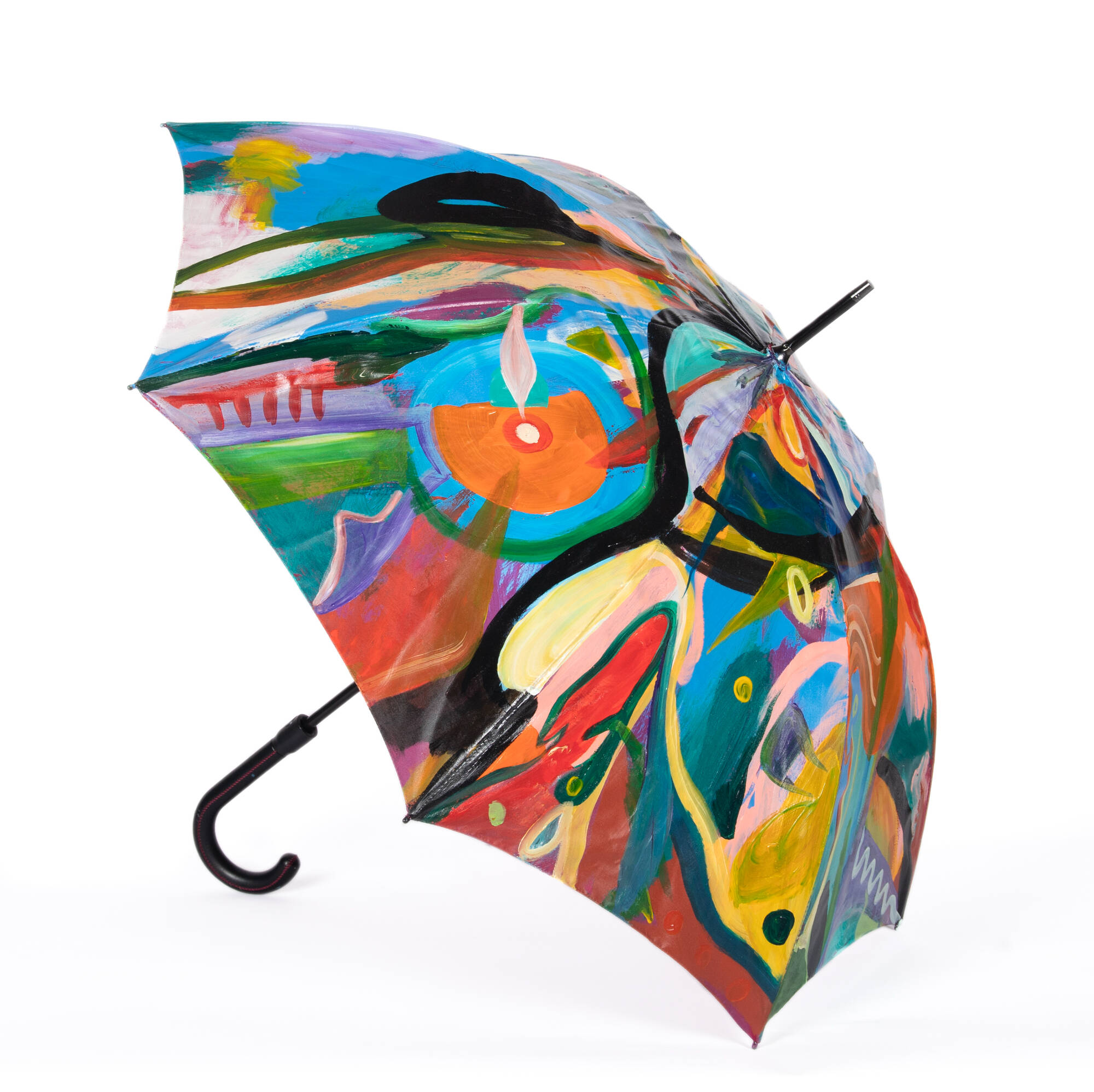 An umbrella that has been painted in a brightly colored abstract pattern.
